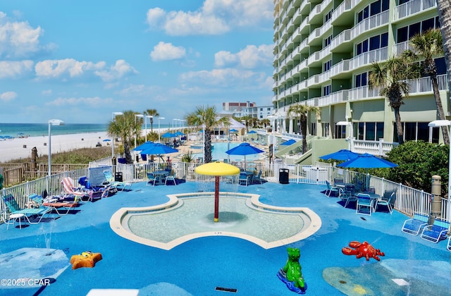 9450 S Thomas Dr Unit 1609C, Panama City Beach, FL 32408 - surrounding community featuring fence, view of water and beach, and a pool
