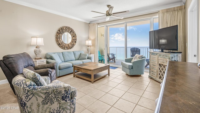 9450 S Thomas Dr Unit 1609C, Panama City Beach, FL 32408 - living area featuring light tile patterned floors, a ceiling fan, and crown molding