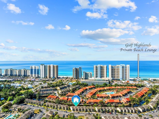 drone / aerial view with a view of city and a water view
