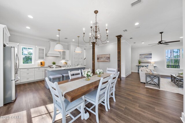 205 Mallard Ln, Santa Rosa Beach, FL 32459 - dining space featuring plenty of natural light, visible vents, and crown molding