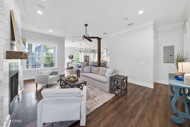 205 Mallard Ln, Santa Rosa Beach, FL 32459 - living room featuring electric panel, dark wood-style flooring, baseboards, ceiling fan with notable chandelier, and a high end fireplace