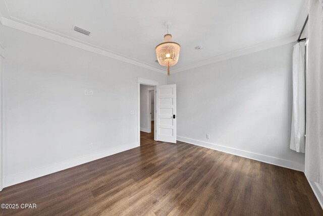 205 Mallard Ln, Santa Rosa Beach, FL 32459 - empty room featuring baseboards, ornamental molding, wood finished floors, and visible vents