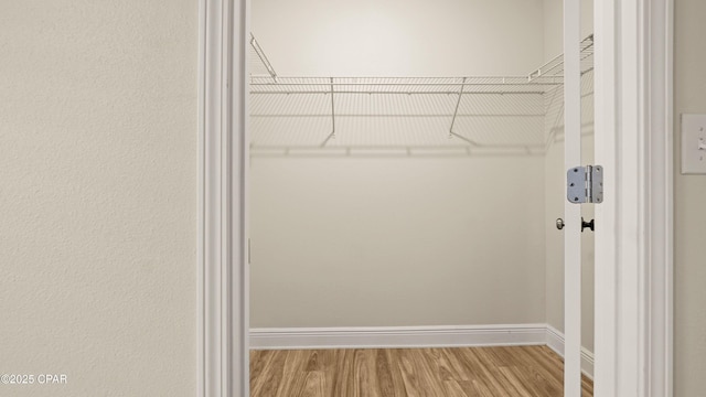 4744 Rosemary St, Panama City, FL 32404 - walk in closet with wood finished floors