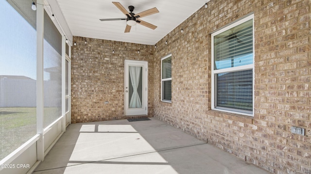4744 Rosemary St, Panama City, FL 32404 - unfurnished sunroom featuring a ceiling fan and plenty of natural light