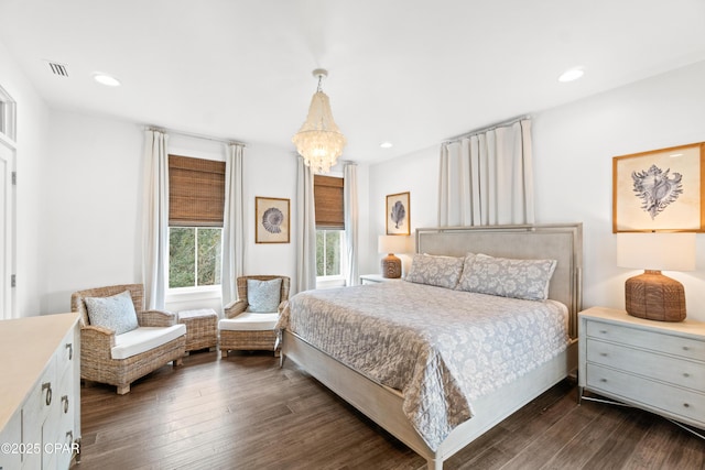 bedroom featuring visible vents, recessed lighting, dark wood-type flooring, and a notable chandelier