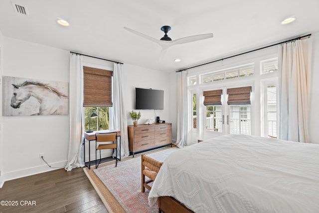 bedroom with visible vents, recessed lighting, wood finished floors, and access to outside