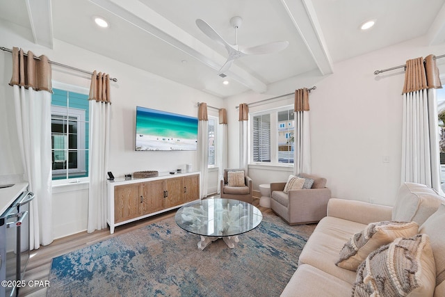 living area featuring a ceiling fan, wood finished floors, beam ceiling, and recessed lighting