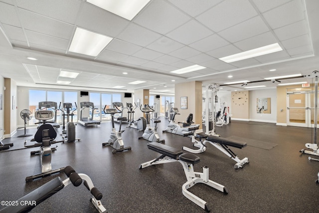 14825 Front Beach Rd Unit 2205, Panama City Beach, FL 32413 - workout area featuring baseboards and a paneled ceiling