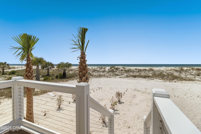 exterior space with a beach view and a water view