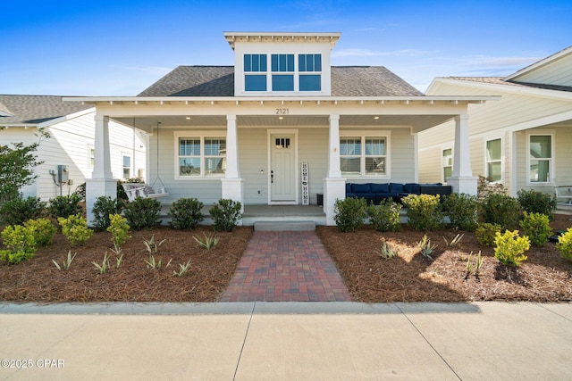 2121 Sedges Ave, Panama City, FL 32405 - bungalow-style home featuring roof with shingles and a porch