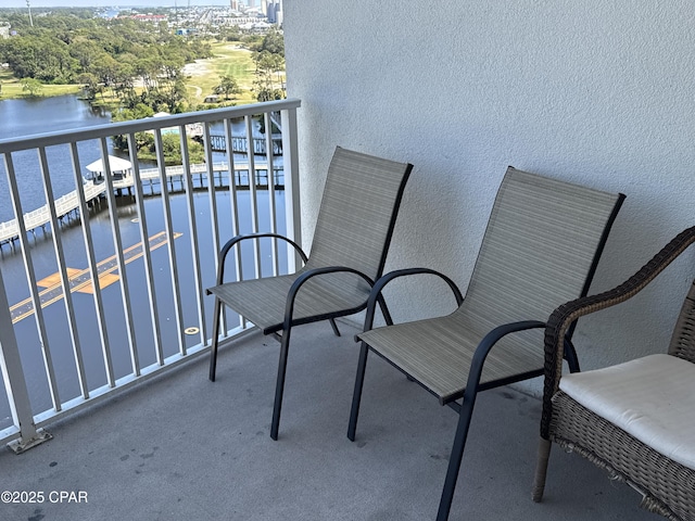 balcony featuring a water view