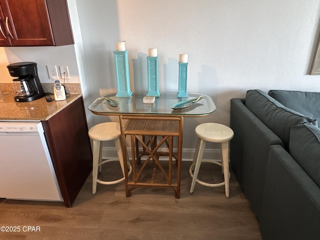 dining room with light wood-type flooring