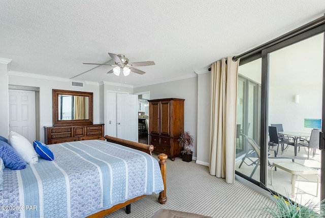 11619 Front Bch Unit 610, Panama City Beach, FL 32407 - bedroom featuring carpet, ornamental molding, ceiling fan, and a textured ceiling