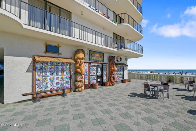 11619 Front Bch Unit 610, Panama City Beach, FL 32407 - view of patio with a water view