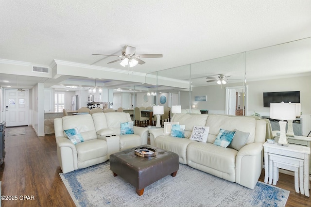 11619 Front Bch Unit 610, Panama City Beach, FL 32407 - living room with a ceiling fan, ornamental molding, wood finished floors, and a textured ceiling