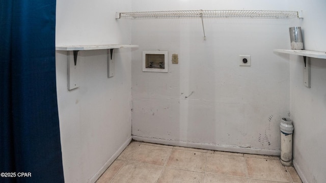 laundry area with baseboards, hookup for a washing machine, laundry area, and hookup for an electric dryer