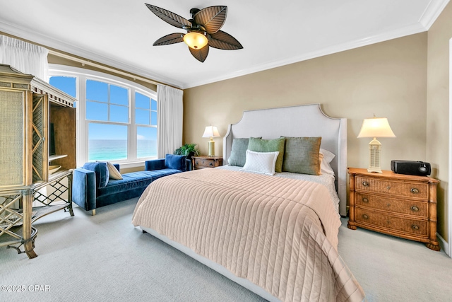 7505 Thomas Dr Unit 512B, Panama City, FL 32408 - carpeted bedroom with crown molding, a ceiling fan, and a water view