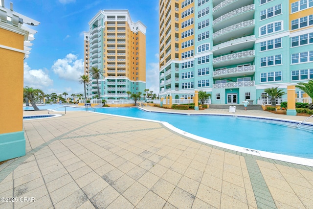 7505 Thomas Dr Unit 512B, Panama City, FL 32408 - community pool featuring a patio area