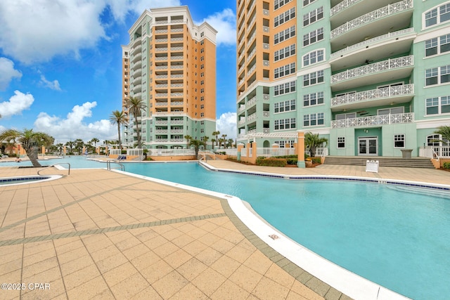 7505 Thomas Dr Unit 512B, Panama City, FL 32408 - community pool featuring a patio area