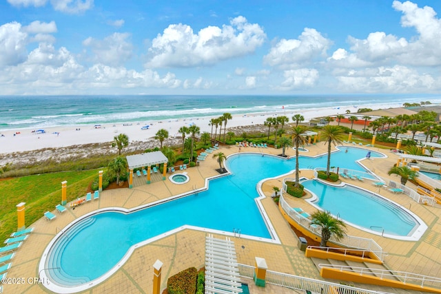 7505 Thomas Dr Unit 512B, Panama City, FL 32408 - community pool featuring view of water and beach and a patio