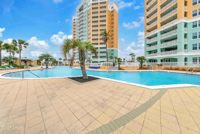 7505 Thomas Dr Unit 512B, Panama City, FL 32408 - community pool featuring a patio