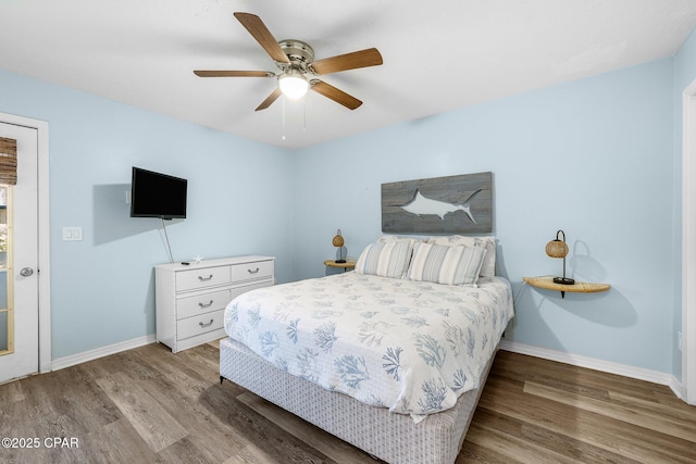 171 Damon Cir, Panama City Beach, FL 32407 - bedroom with wood finished floors, baseboards, and a ceiling fan