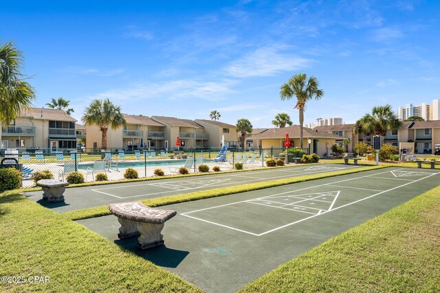 171 Damon Cir, Panama City Beach, FL 32407 - view of property's community with shuffleboard, fence, a residential view, and uncovered parking