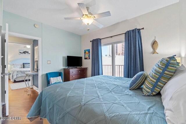 9900 S Thomas Dr Unit 819, Panama City Beach, FL 32408 - bedroom with baseboards, a ceiling fan, wood finished floors, and access to exterior