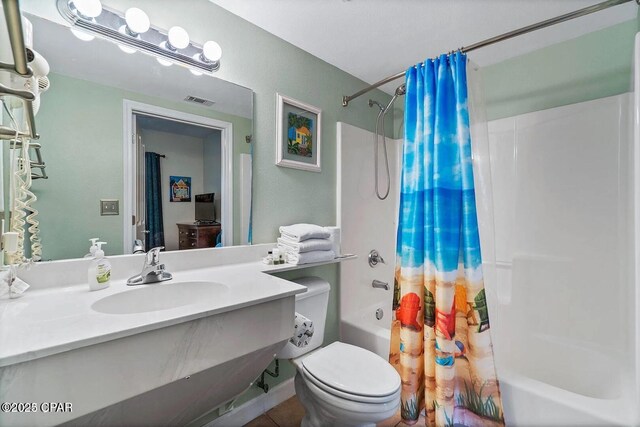 9900 S Thomas Dr Unit 819, Panama City Beach, FL 32408 - bathroom featuring vanity, shower / bath combo, toilet, and visible vents