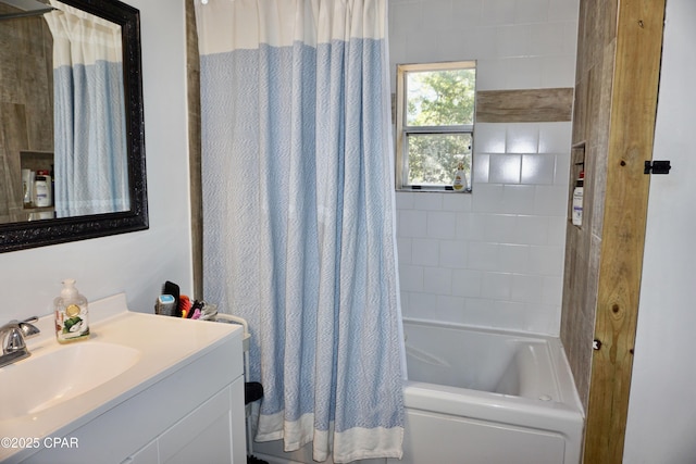 full bathroom with vanity and shower / tub combo with curtain