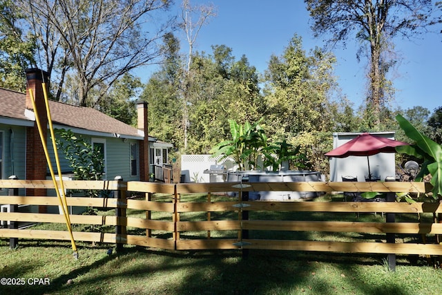 exterior space featuring fence private yard