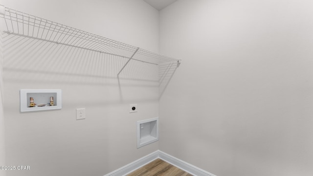 laundry room with washer hookup, laundry area, electric dryer hookup, baseboards, and wood finished floors