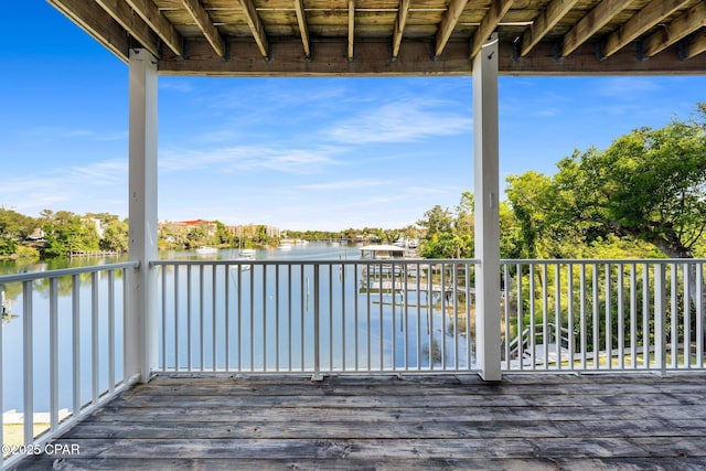 wooden terrace with a water view