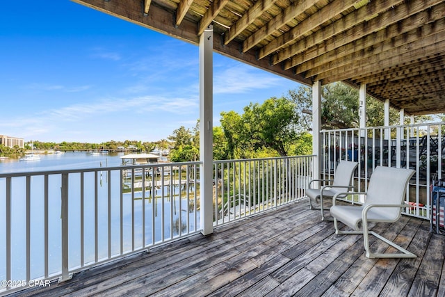 deck featuring a water view