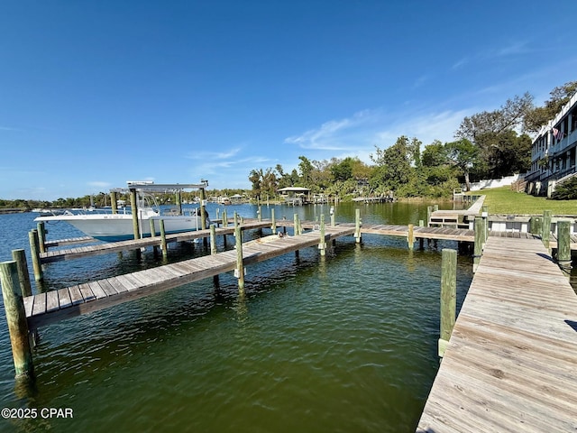 view of dock with a water view and boat lift