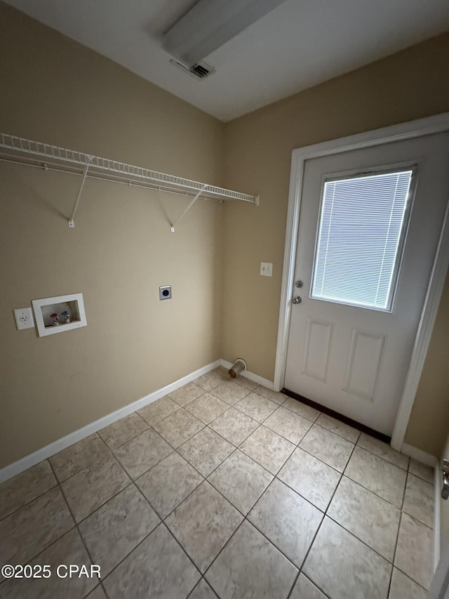 clothes washing area with electric dryer hookup, visible vents, light tile patterned floors, and hookup for a washing machine