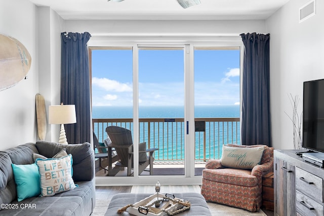 14825 Front Beach Rd Unit 2209, Panama City Beach, FL 32413 - living area with wood finished floors and plenty of natural light