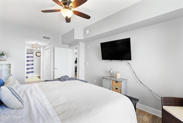 14825 Front Beach Rd Unit 2209, Panama City Beach, FL 32413 - bedroom featuring wood finished floors, baseboards, and ceiling fan