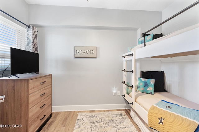 14825 Front Beach Rd Unit 2209, Panama City Beach, FL 32413 - bedroom with light wood-style floors and baseboards