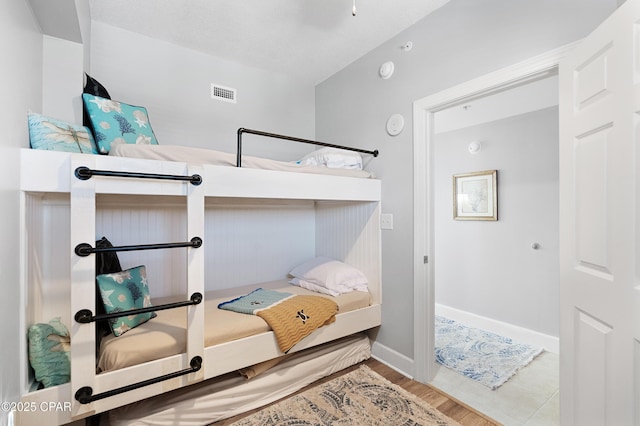 14825 Front Beach Rd Unit 2209, Panama City Beach, FL 32413 - bedroom featuring wood finished floors and baseboards