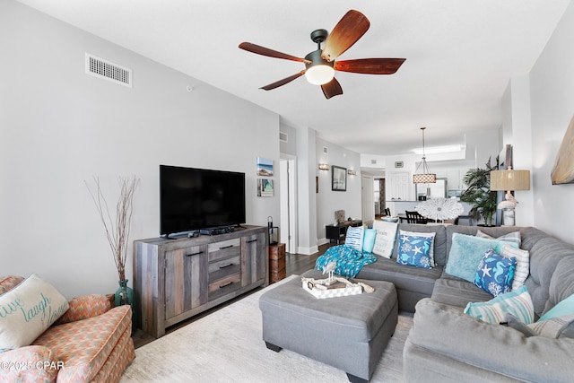 14825 Front Beach Rd Unit 2209, Panama City Beach, FL 32413 - living room featuring ceiling fan and wood finished floors