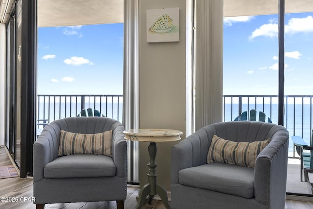 17155 Front Beach Rd Unit E602, Panama City Beach, FL 32413 - sunroom / solarium with a water view and plenty of natural light