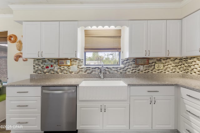 kitchen featuring stainless steel dishwasher, crown molding, a sink, and backsplash