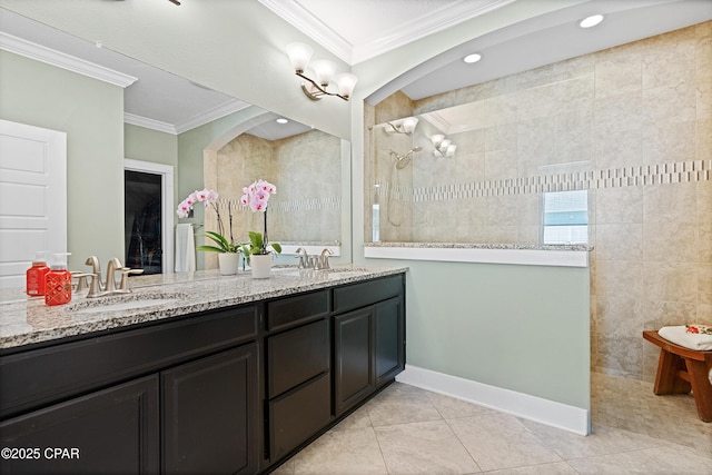 full bath with double vanity, tile patterned flooring, walk in shower, a sink, and ornamental molding