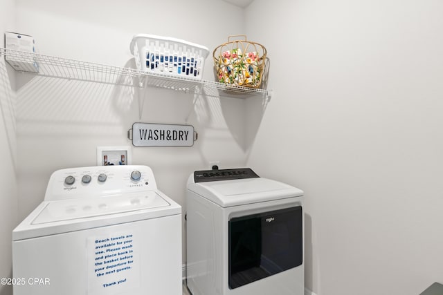 laundry area featuring laundry area and independent washer and dryer