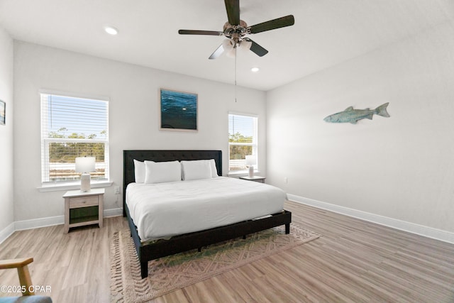 bedroom with baseboards, recessed lighting, a ceiling fan, and wood finished floors