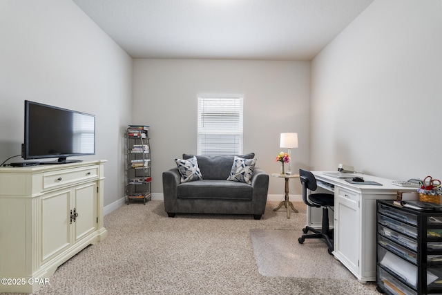 office with light colored carpet and baseboards