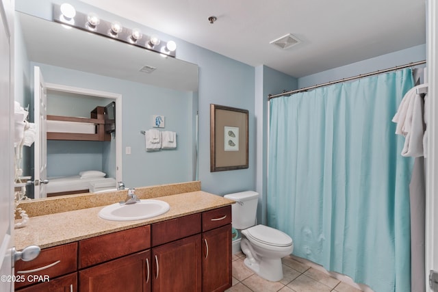 bathroom with tile patterned floors, toilet, visible vents, curtained shower, and vanity