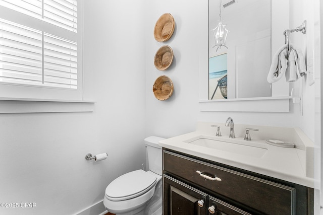 half bath with toilet and vanity