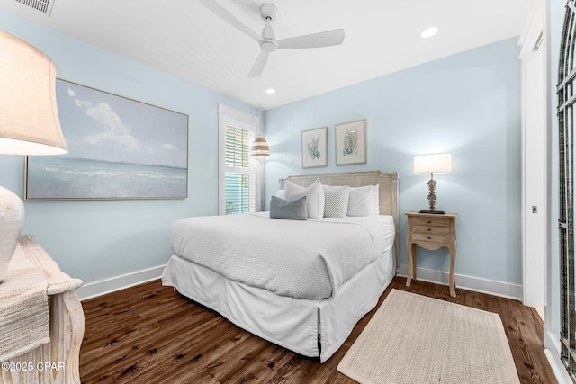 bedroom featuring recessed lighting, wood finished floors, a ceiling fan, and baseboards